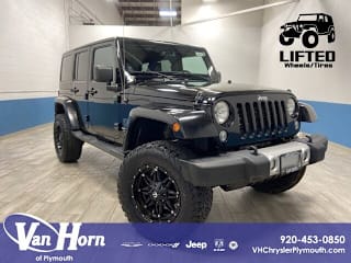 2014 Jeep Wrangler Unlimited Sahara 1C4BJWEG6EL101001 2014 Jeep Wrangler Unlimited Sahara