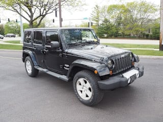 2011 Jeep Wrangler Unlimited Sahara 1J4HA5H15BL523858 2011 Jeep Wrangler Unlimited Sahara