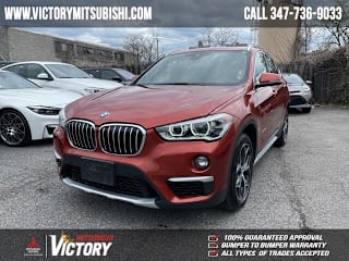 2018 BMW X1 WBXHT3C34J5F92031 2018 BMW X1