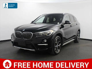 2018 BMW X1 WBXHT3C32J5K23262 2018 BMW X1