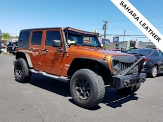 2011 Jeep Wrangler Unlimited Sahara 1J4HA5H18BL522302 2011 Jeep Wrangler Unlimited Sahara