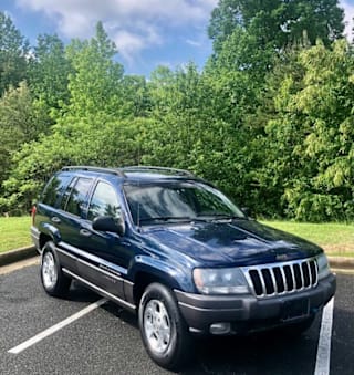 2002 Jeep Grand Cherokee Sport 1J8GW38S12C233643 2002 Jeep Grand Cherokee Sport