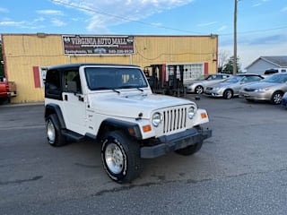 2002 Jeep Wrangler Sport 1J4FA49S42P705830 2002 Jeep Wrangler Sport