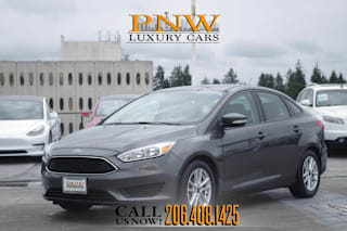 2015 Ford Focus 1FADP3F22FL370094 2015 Ford Focus