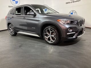 2018 BMW X1 WBXHT3Z31J4A65979 2018 BMW X1