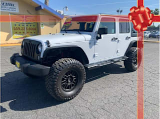 2014 Jeep Wrangler Unlimited Sport 1C4BJWDG4EL112600 2014 Jeep Wrangler Unlimited Sport