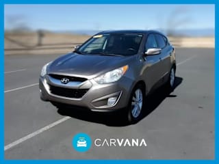 2010 Hyundai Tucson KM8JUCAC0AU023982 2010 Hyundai Tucson