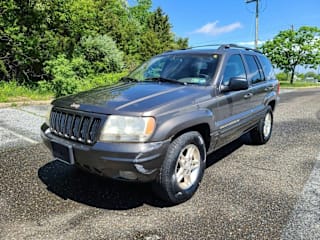 1999 Jeep Grand Cherokee Limited 1J4GW68S8XC731073 1999 Jeep Grand Cherokee Limited