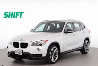 2014 BMW X1 WBAVM1C56EVW47453 2014 BMW X1