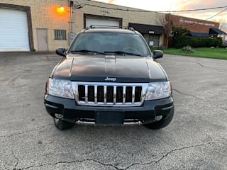 2004 Jeep Grand Cherokee 1J8GW68J34C251587 2004 Jeep Grand Cherokee