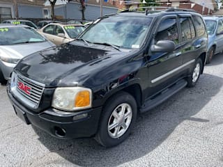 2009 GMC Envoy SLE 1GKDT33S292130584 2009 GMC Envoy SLE
