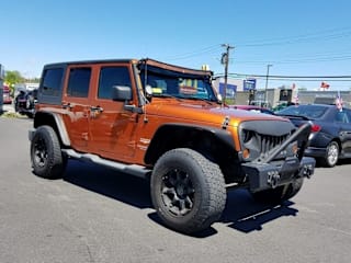 2011 Jeep Wrangler Unlimited Sahara 1J4HA5H18BL522302 2011 Jeep Wrangler Unlimited Sahara