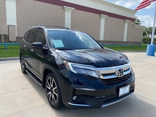 2019 Honda Pilot Touring-8P 5FNYF5H90KB013711 2019 Honda Pilot Touring-8P
