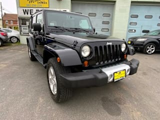 2010 Jeep Wrangler Unlimited Sahara 1J4BA5H10AL105033 2010 Jeep Wrangler Unlimited Sahara