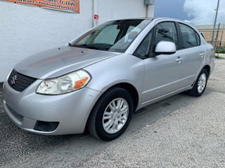 2012 Suzuki SX4 LE JS2YC5A36C6305221 2012 Suzuki SX4 LE