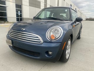 2009 MINI Cooper Base WMWMF335X9TU73907 2009 MINI Cooper Base