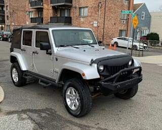 2008 Jeep Wrangler Unlimited Sahara 1J4GA59138L554013 2008 Jeep Wrangler Unlimited Sahara