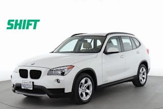 2014 BMW X1 WBAVM1C57EVW51057 2014 BMW X1