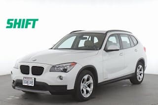 2014 BMW X1 WBAVM1C51EVW53158 2014 BMW X1