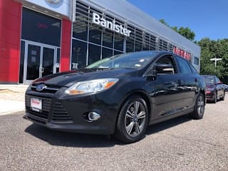 2014 Ford Focus SE 1FADP3F23EL104677 2014 Ford Focus SE