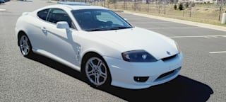 2006 Hyundai Tiburon KMHHN65F16U208809 2006 Hyundai Tiburon